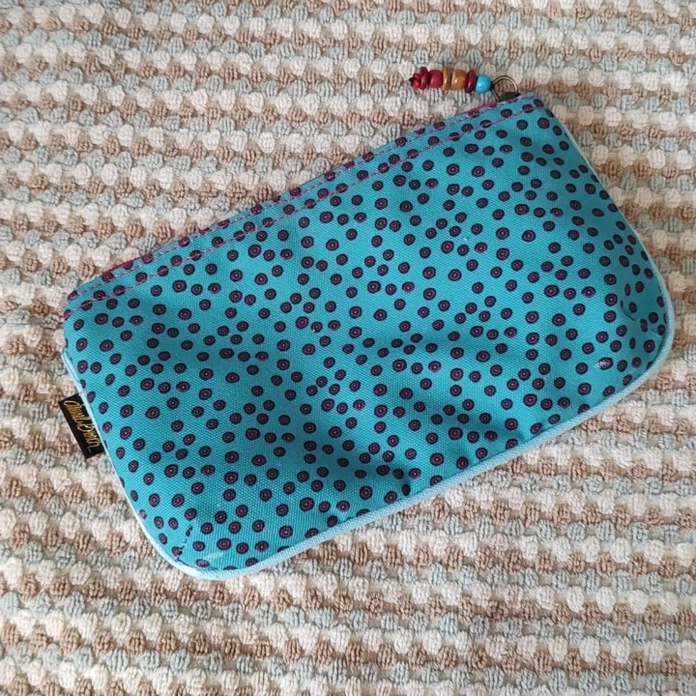 LAUREL BURCH small clutch make up bag in pink and blue.